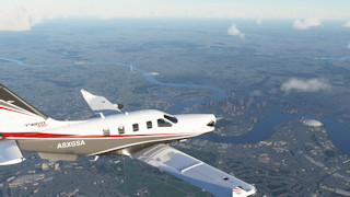 Over London near London City (EGLC). O2 Arena, London Bridge, and the Shard visible